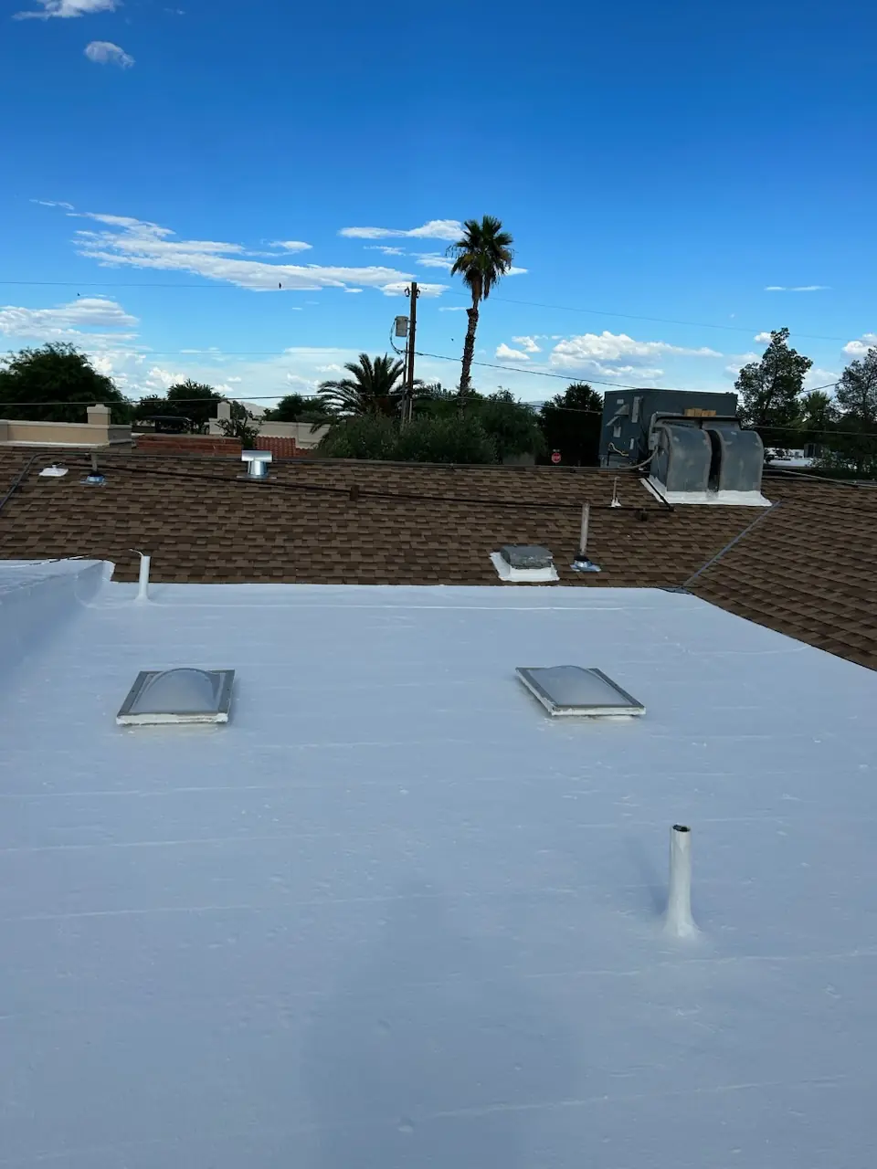 Inspection view of a coated roof with skylights, vents and penetrations